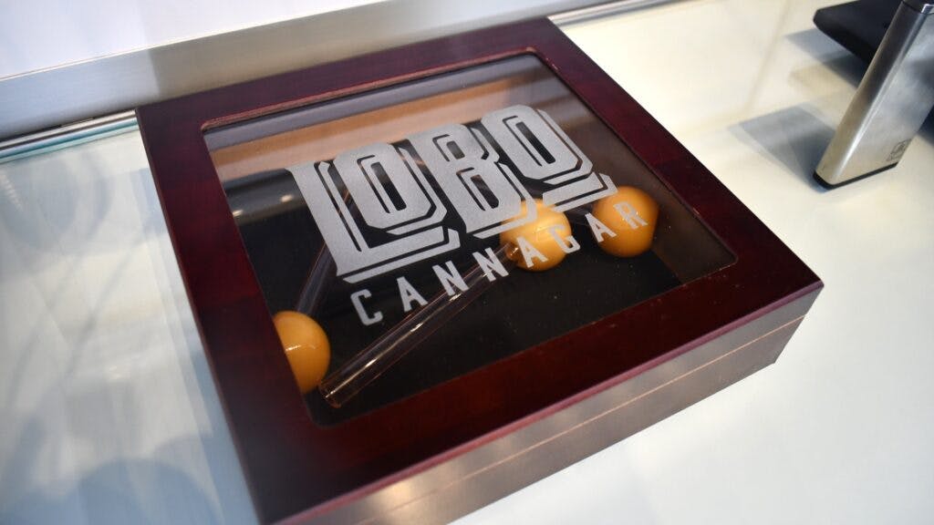 Lobo Cannagars' high-end box of pre-rolled cannabis on display at Smacked Village New York dispensary. (Calvin Stovall / Leafly)
